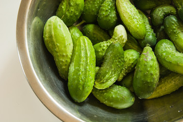 Green cucumbers in a bowl