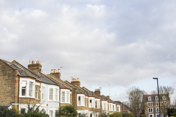 Fototapeta na wymiar Suburban Neighborhood Houses in a winter sunny day in West London, United Kingdom.