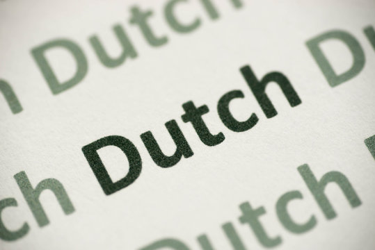 word Dutch anguage printed on paper macro