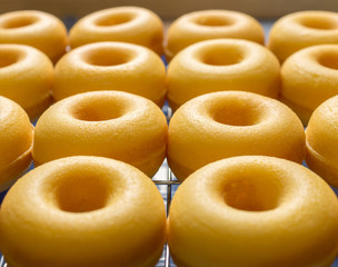 Close-up image of group of baked butter milk donuts
