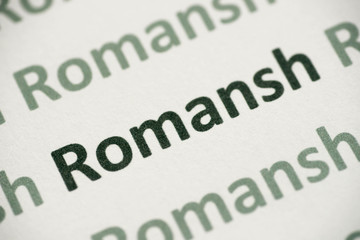 word Romansh language printed on paper macro © aga7ta
