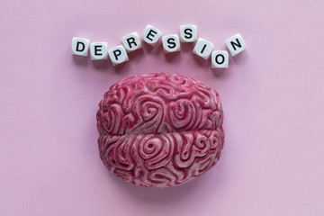 Human brain with the word depression. Mental health concept