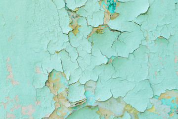 Obraz premium Close-up detail of cracked paint on wall.