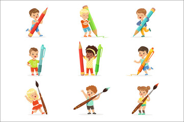 Fototapeta na wymiar Smiling young boys and girls holding big pencils, pens and paintbrushes, set for label design. Cartoon detailed colorful Illustrations