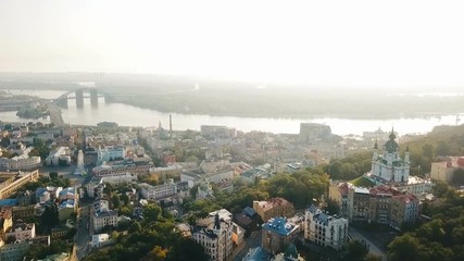 Andrew's Descent historcal old street in Kiev (Kiyv) Ukraine. Top view from above. Aerial drone video footage. Sunrise backlight