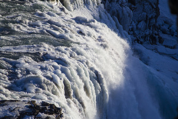 The amazing show of the Gulfoss waterfall during winter time. Gulfoss is located in the canyon of Hvítá river in southwest Iceland.