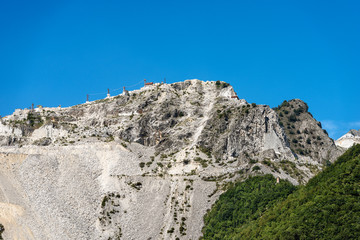 Fototapeta na wymiar Quarry of white Carrara Marble - Apuan Alps Italy