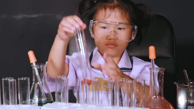 asian children in school science laboratory 