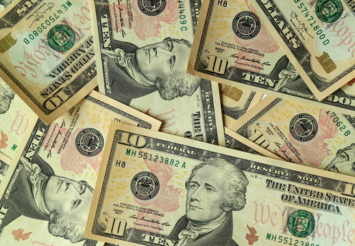 Top view of pile of United States ten dollar ($10) bills