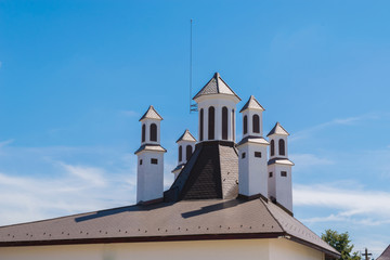 Fototapeta premium detail of roof with miniature turrets and with lighting strike protection installed.
