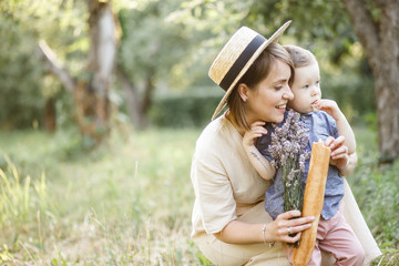 Mom and child are walking in the park