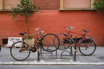 Fototapeta na wymiar Bologna, Italy - July, 30, 2018: bicycles on a parking in a center of Bologna