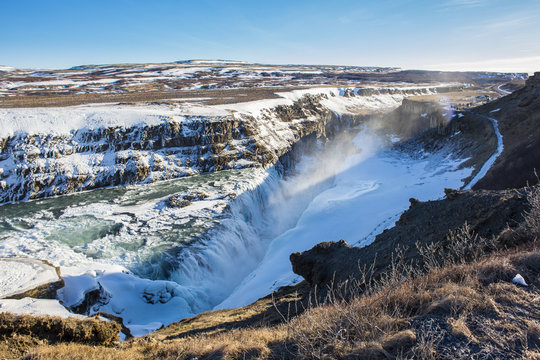 The amazing show of the Gulfoss waterfall during winter time. Gulfoss is located in the canyon of Hv&iacute;t&aacute; river in southwest Iceland.