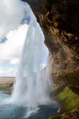 Fototapeta na wymiar view of the waterfall of Iceland, tourists, screensaver.