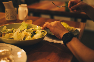 Eating organic vegetable salad. Selective focus. Copy space.