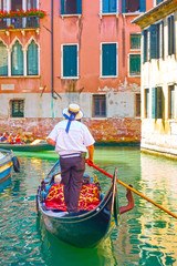 Gondolier in Venice © Roman Sigaev