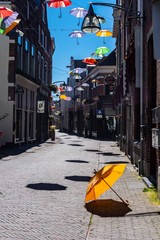 Street with umbrella in Deventer