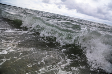 Storm waves on the seashore as a background