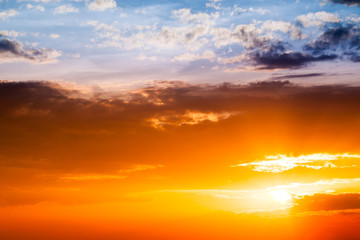 sun ray is go down and amazing dramatic  orange cloud, twilight sky