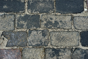 old cobblestone road for background or texture