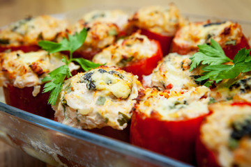 Stuffed pepper with chicken fillet, brown rice, vegetables and herbs. A dietary dish.