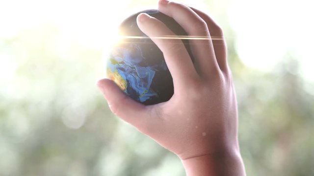 Globe on child hands