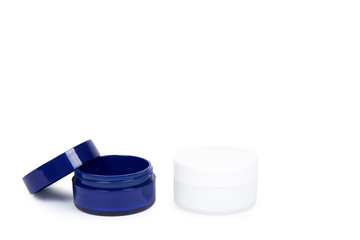 Clean cream bottle isolated on white background, copy space template