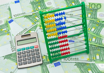 Image of abacus on money background
