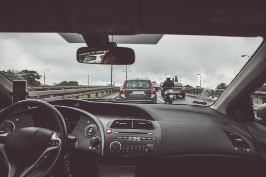 Driving A Passenger Car In Traffic Jam, View From Inside On Crowded Road