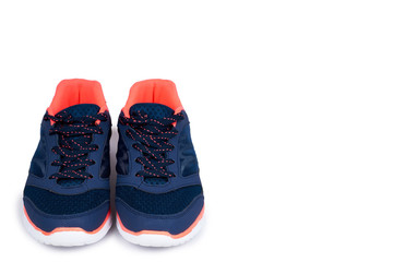 Female blue sport shoes isolated on white background, copy space template