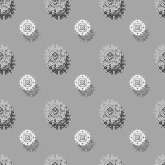 Seamless background pattern with a variety of colored floral motifs.