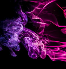 Colored smoke on black background