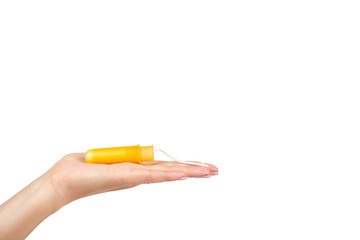 clean cotton tampon in case with hand isolated on white background, copy space template.