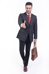 Businessman isolated in white background.