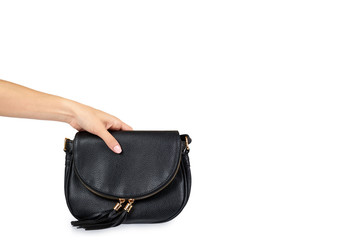 Black leather shoulder bag with hand isolated on a white background , copy space template.