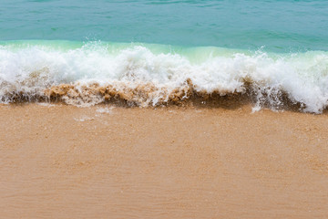 soft wave of an ocean on a sandy beach