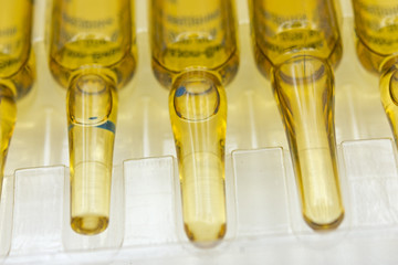 many ampoules set in container