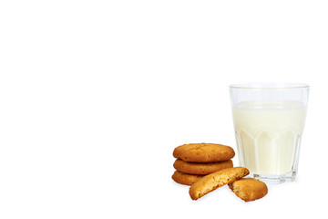 Glass of milk and homemade cookies isolated on white background, copy space template