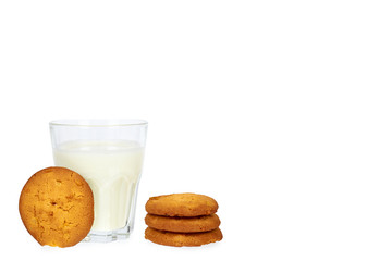 Glass of milk and homemade cookies isolated on white background, copy space template
