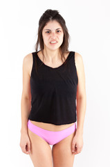 Fototapeta premium Contempt emotional girl on a light background