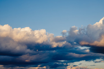 Rain clouds against blue sky. Concept weather forecast