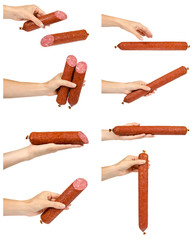 set of different smoked salami sausage piece with hand, isolated on white background.