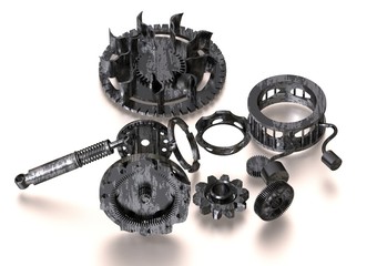 Black and silver disassembled gear mechanism on a white