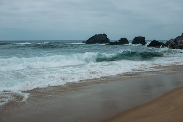 Rock structures by the coastline in Portugal