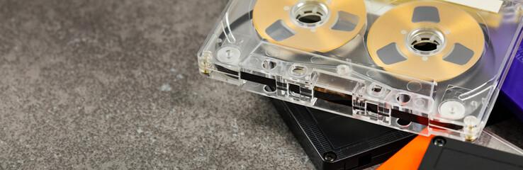 Vintage Reel to Reel Compact Audio Cassette Tape Panoramic image. Selective focus.