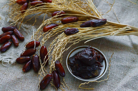 Raw Organic Fresh dates together with fint jam and dry branch from dates.