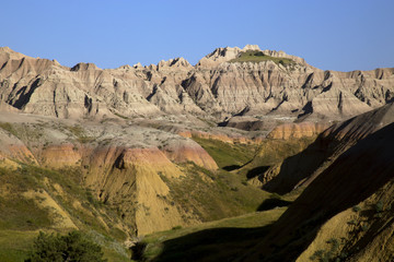 Eroding peaks and yellow mounds of the Badlands National Park South Dakota