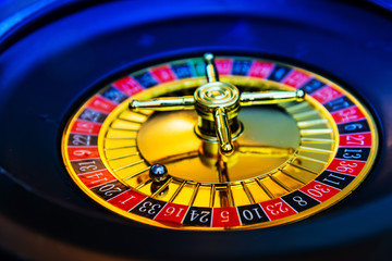 Casino playing roulette on green table