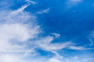 Fluffy clouds and blue sky