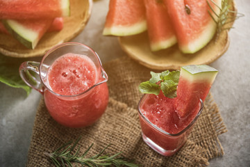 Watermelon drink in glasses with slices of watermelon